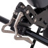 Système de propulsion électrique pour fauteuil roulant avec barre pour les repose-pieds